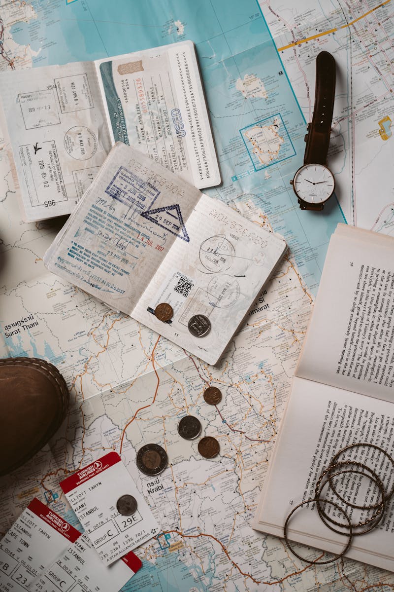 Photo by Taryn Elliott Explore wanderlust with flatlay of passport, map, and travel essentials.